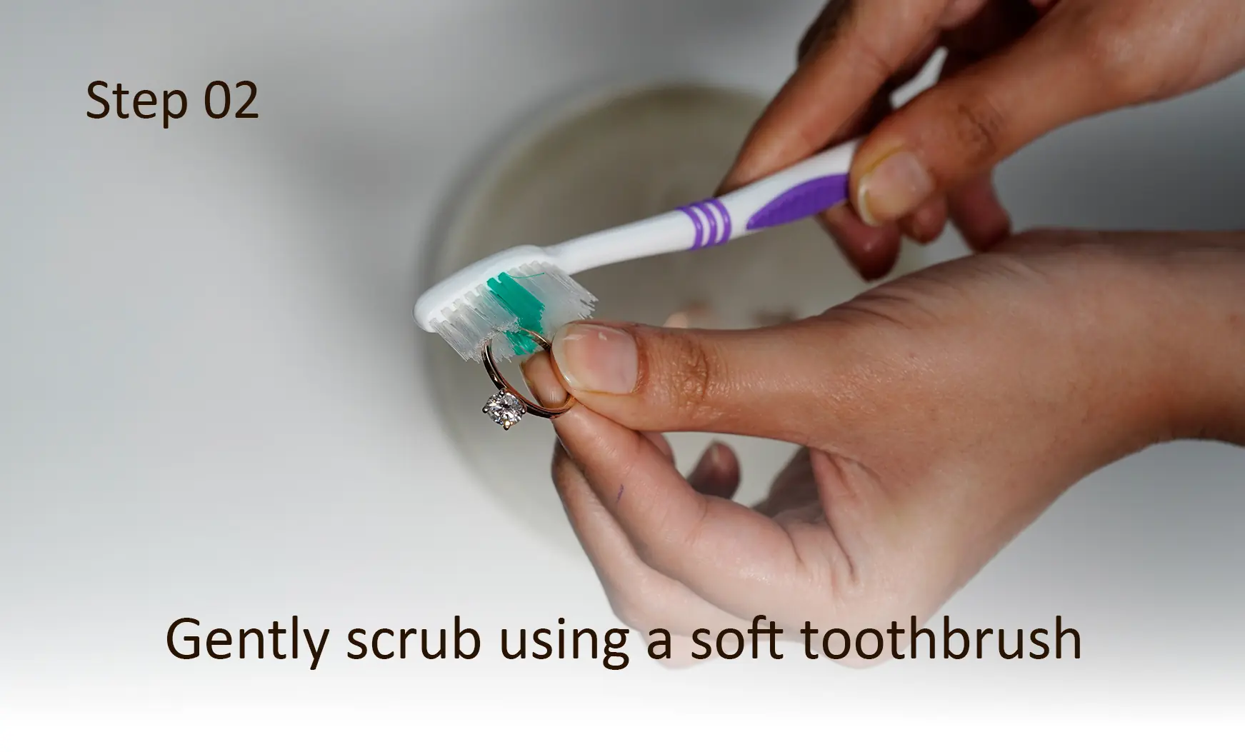 Step 2: Gently scrub using a soft toothbrush